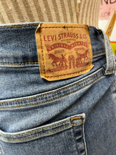 Load image into Gallery viewer, Levi’s 720 High Rise Super Skinny Jeans (Size 30”