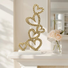 Cargar imagen en el visor de la galería, Stacked Gold Hearts on Metal Base
